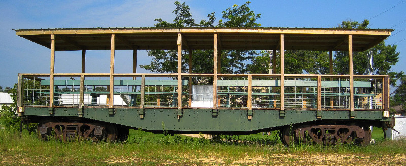 Green flat car